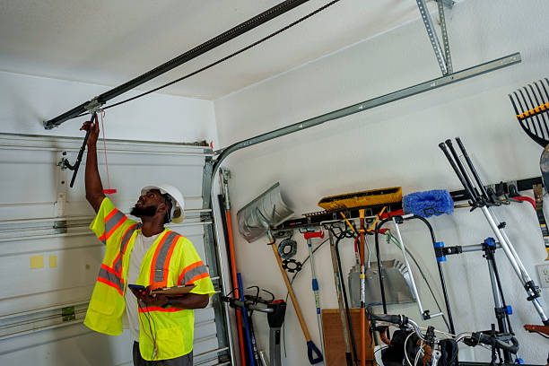 Professional Garage Door Panel Replacement technician working in Wasilla, AK